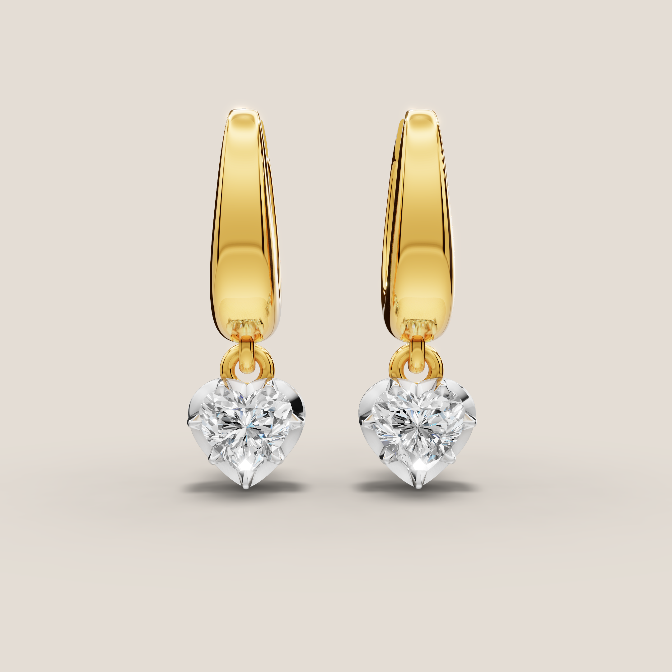 Gold hoop earrings with round gemstones on a beige background