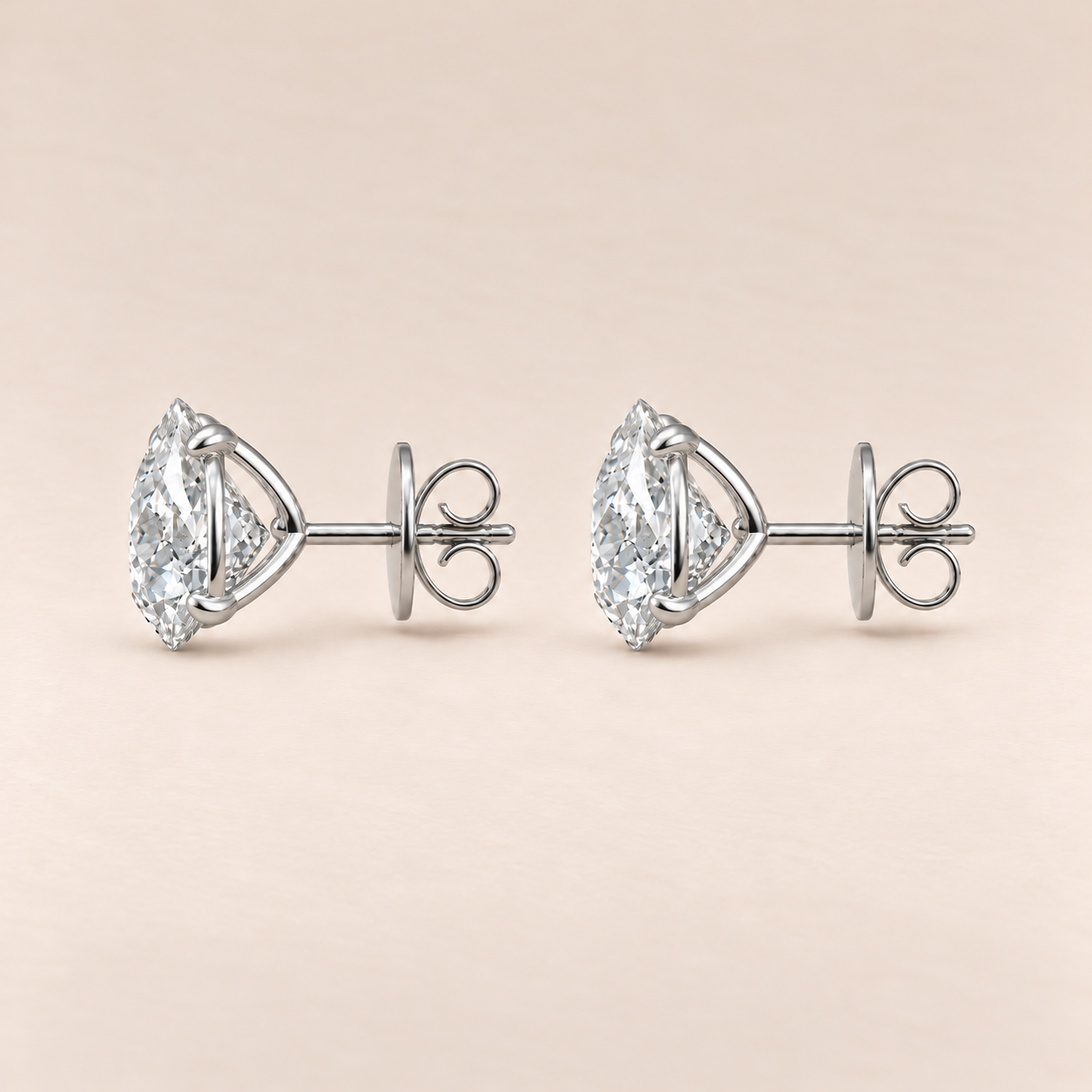 bianca-ray-4ct-pear-cut-lab-grown-diamond-four-claw-martini-stud-earrings-14k-white-gold-side.png
