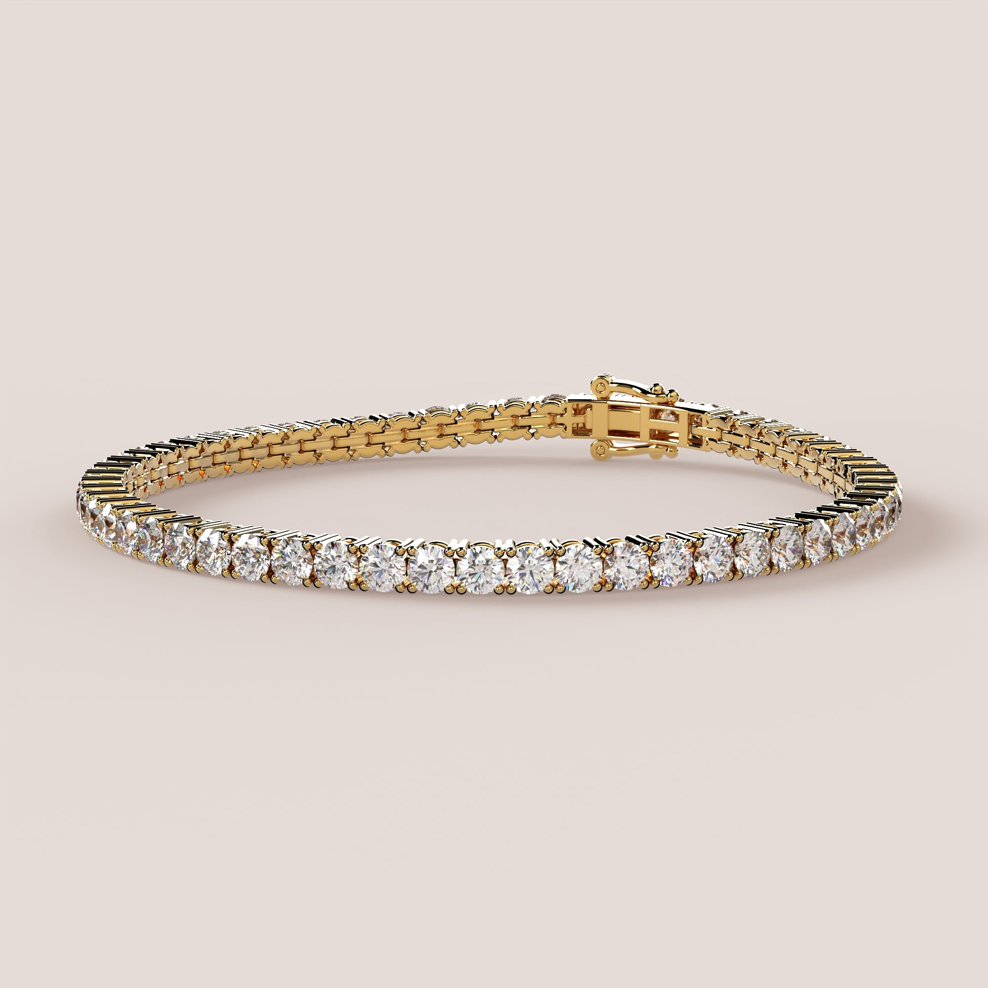 A tennis bracelet featuring lab-grown diamonds set in a 4-claw double bezel, crafted in 14k white gold.