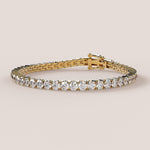 A tennis bracelet featuring lab-grown diamonds set in a 4-claw double bezel, crafted in 14k white gold.