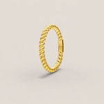 Gold ring 9k with a textured design on a light gray background